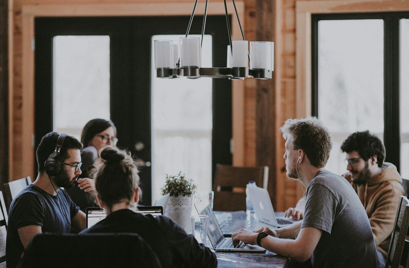 Team in discussion around a conference table